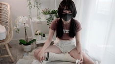 Asian teen likes toys inside her wet muff