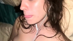 Busty amateur brunette toying herself on web cam