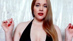 Busty Redhead MILF in a Corset Plays Solo
