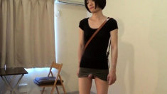 crossdresser wearing a mini skirt